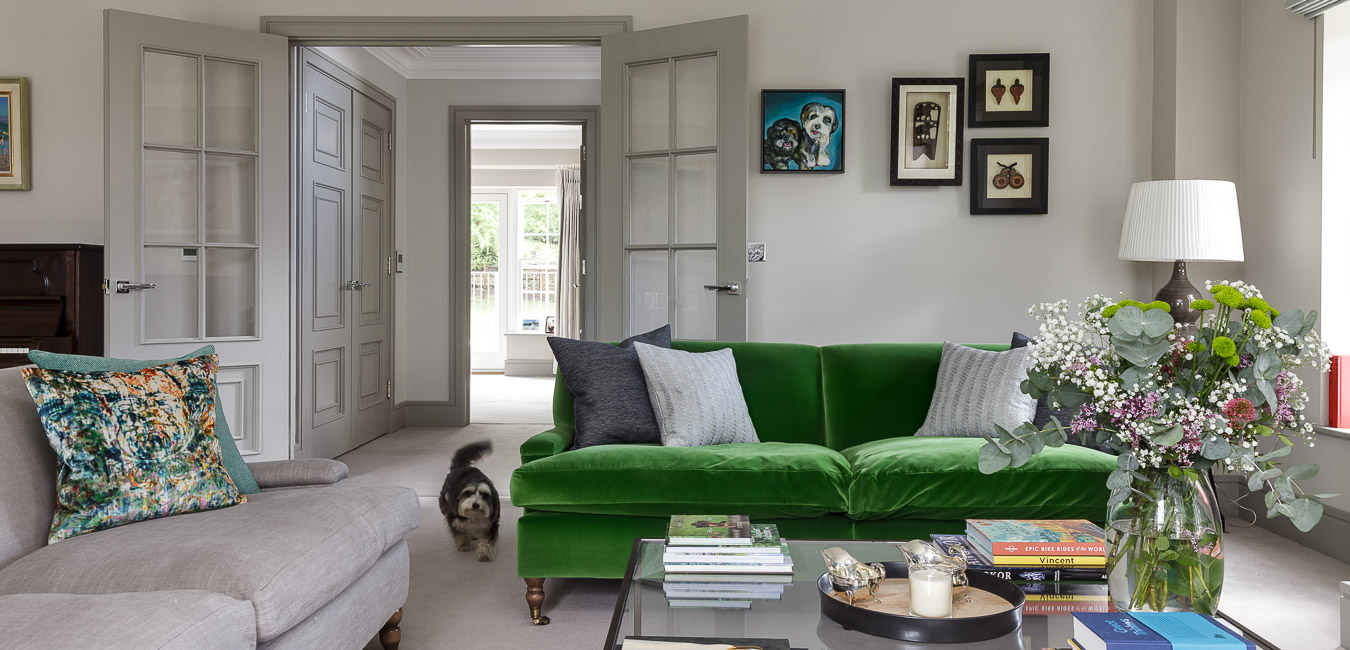 House and garden green sofa in a modern townhouse in Cobham in Surrey