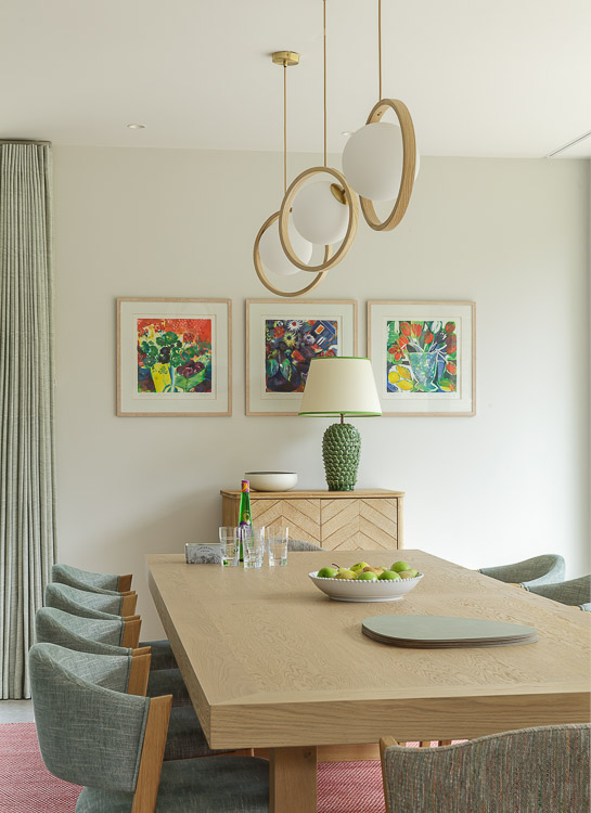 contemporary wooden dining table and Tom raffield lights