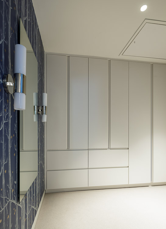 dressing room with modern joinery and j groove handle