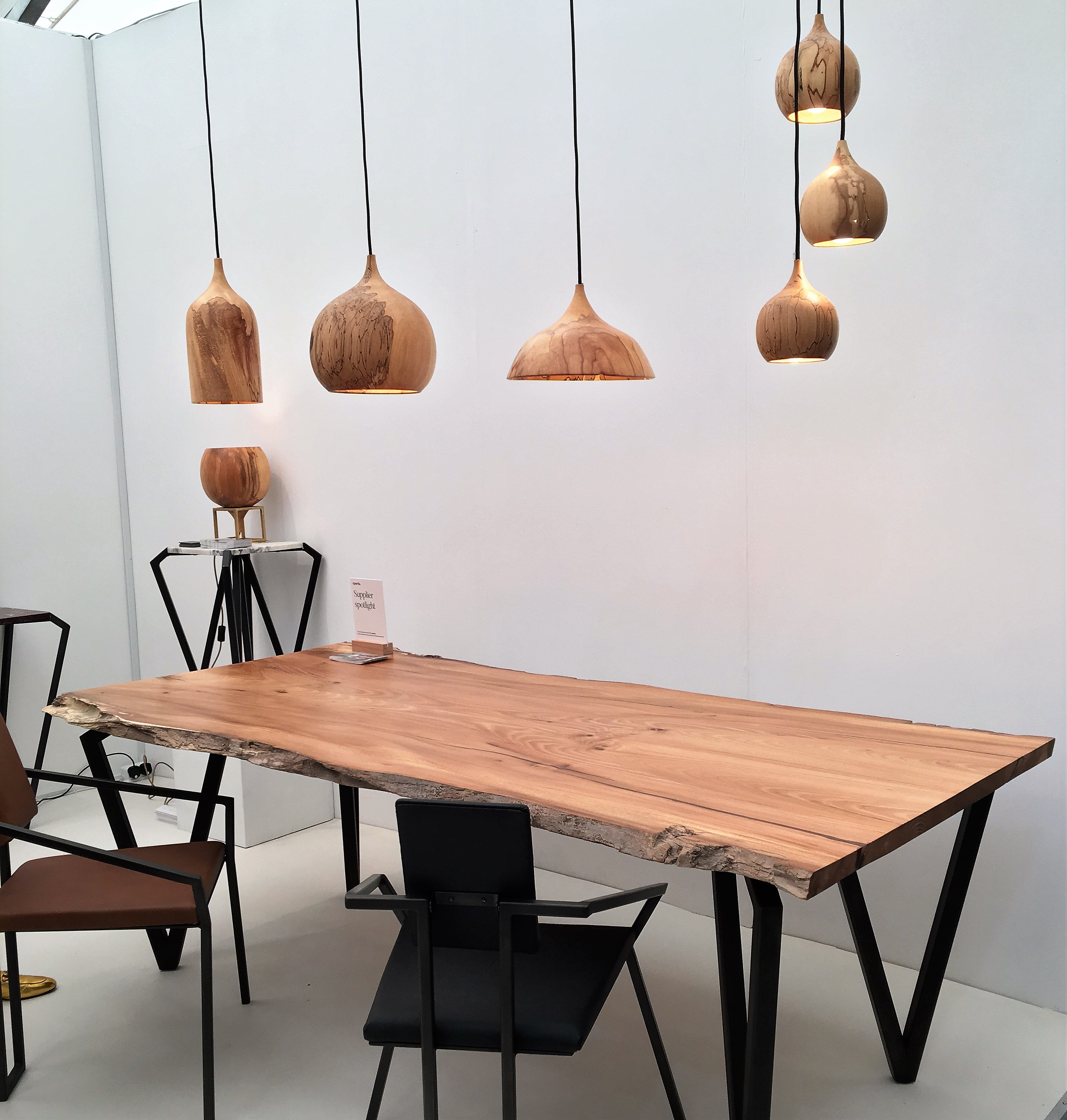 Wood and metal lights and table by Tamasine Osher Design